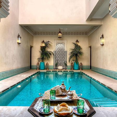 ホテル リヤド クニザ マラケシュ プール 写真 The swimming pool at the hotel