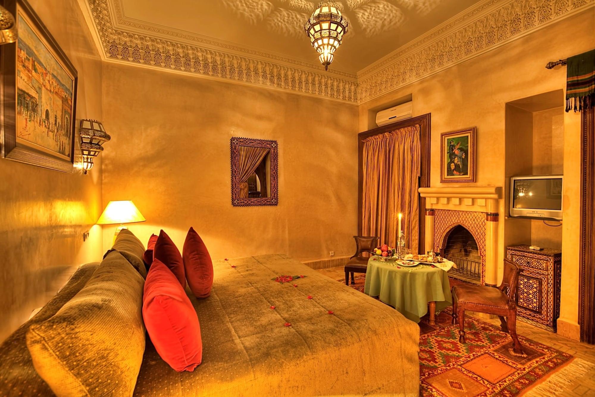 ホテル リヤド クニザ マラケシュ エクステリア 写真 A bedroom in the hotel